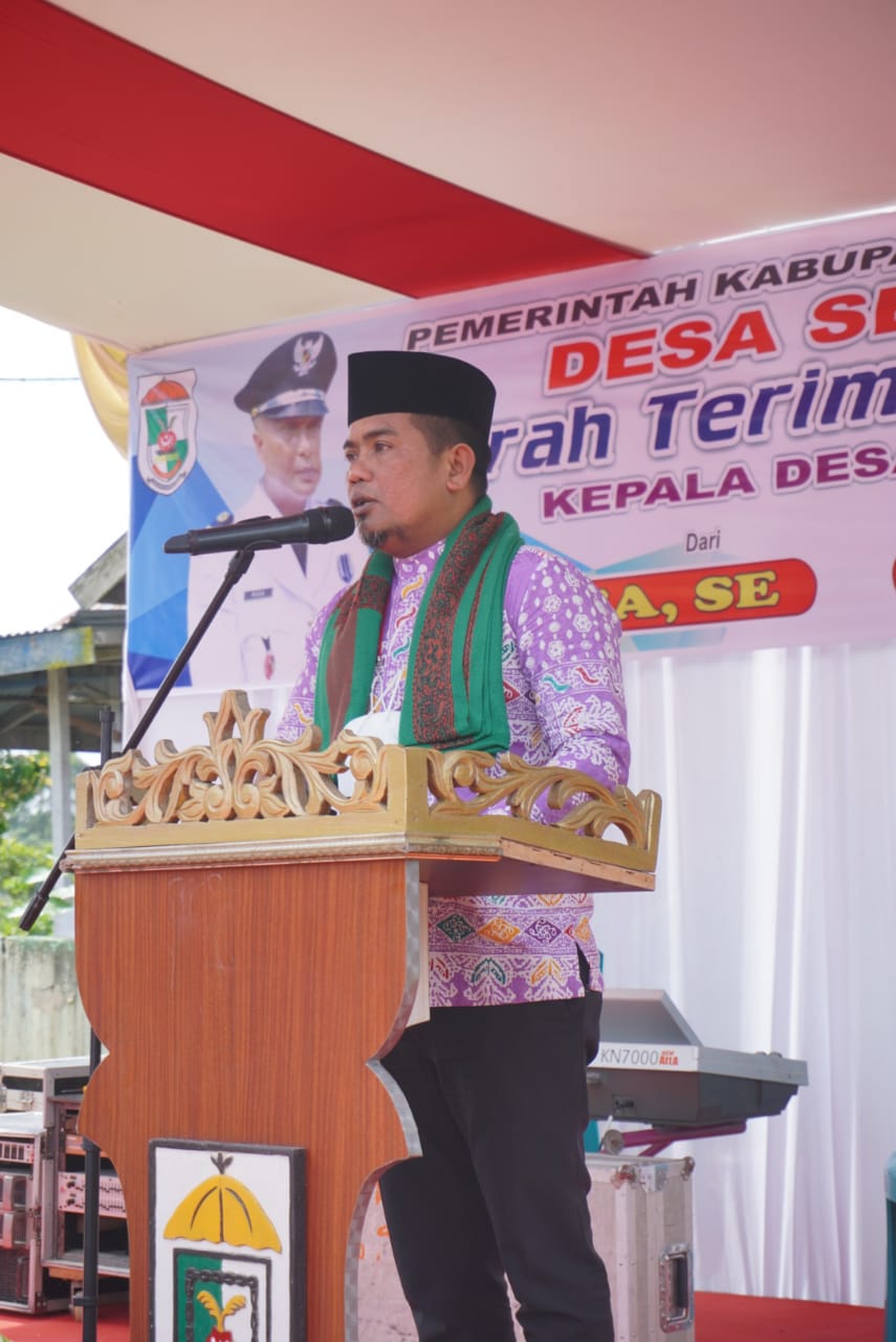 You are currently viewing Bupati Pelalawan Hadiri Pisah Sambut dan Syukuran Kepala Desa Sering