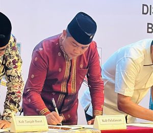 Read more about the article Bupati Pelalawan Tandatangani MoU Pembangunan Jaringan Gas Rumah Tangga Tahap II